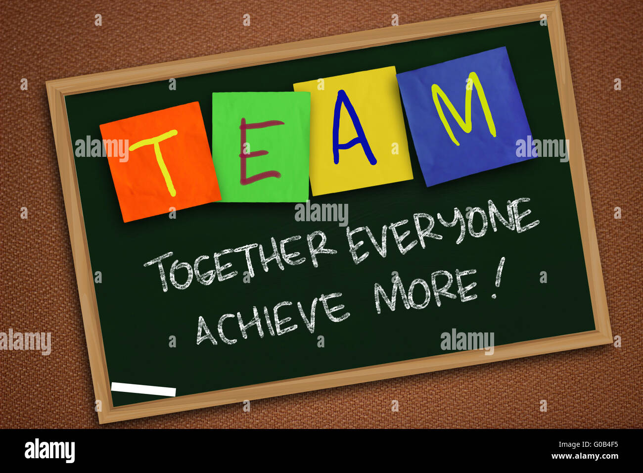 Chalk board writing of TEAM Together Everyone Achieves 