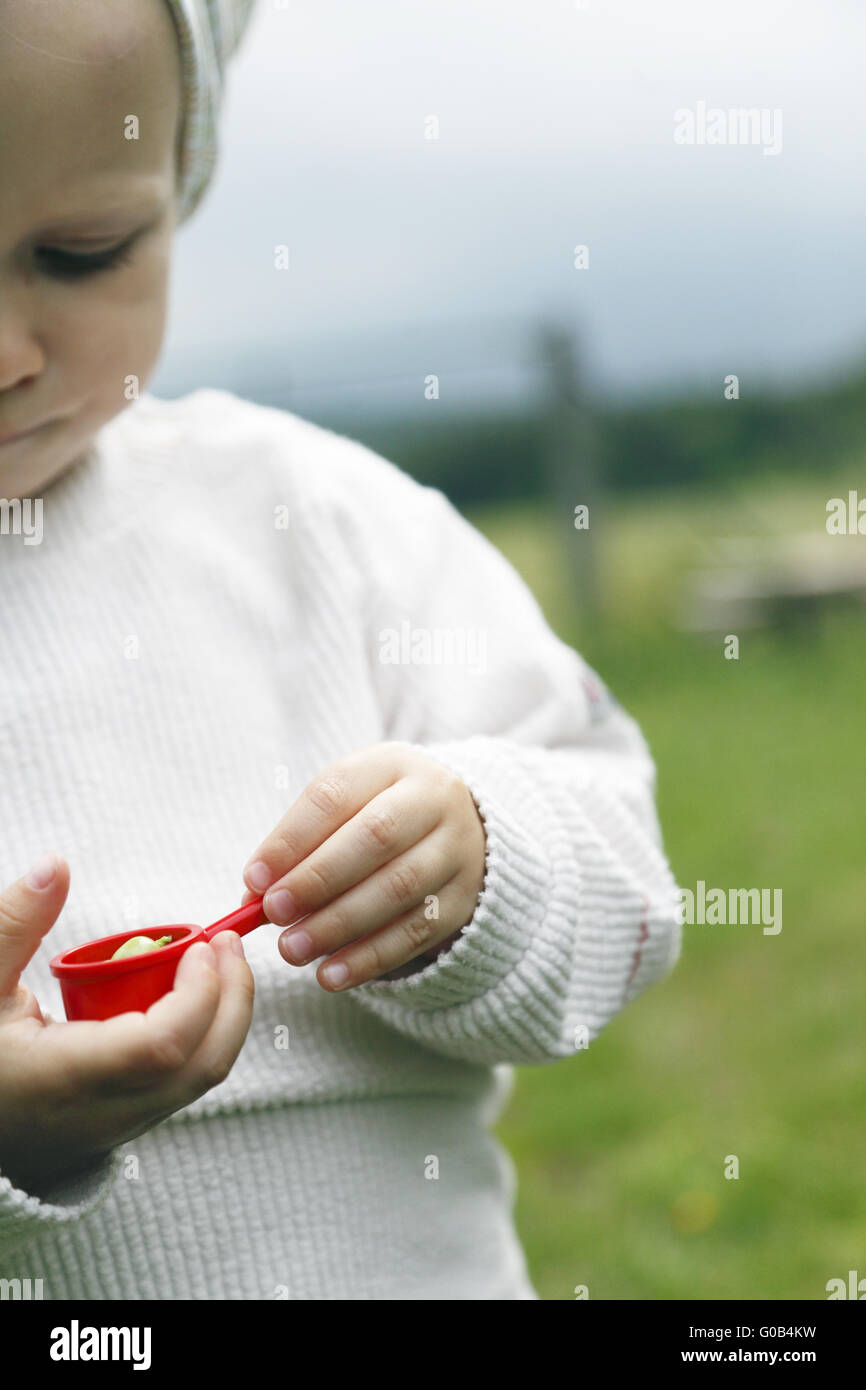Child cooking pot hi-res stock photography and images - Alamy