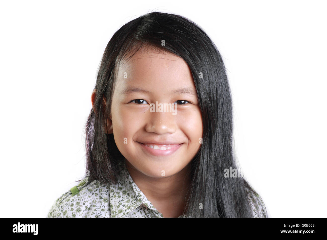 portrait of a happy little Asian girl smiling isolated on white Stock Photo