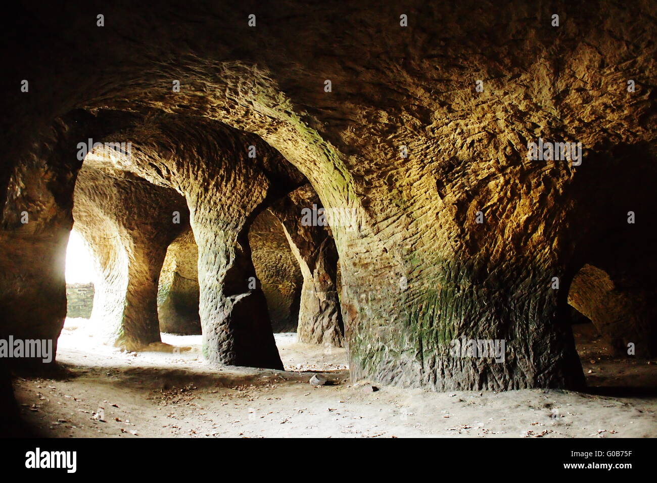 Ancient rock cave hollow cavern Stock Photo