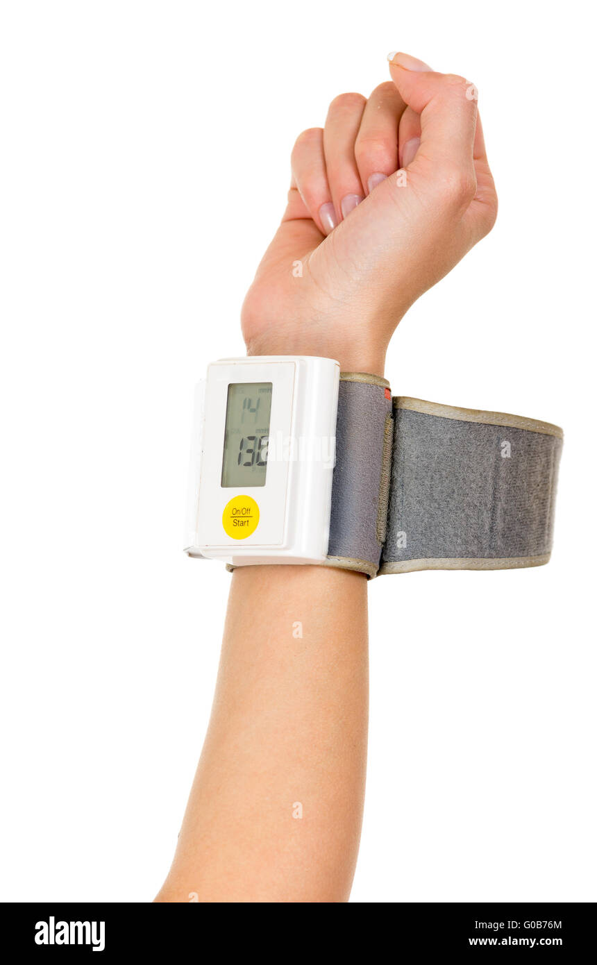 Right arm vertically wearing glucose meter around wrist with white ...