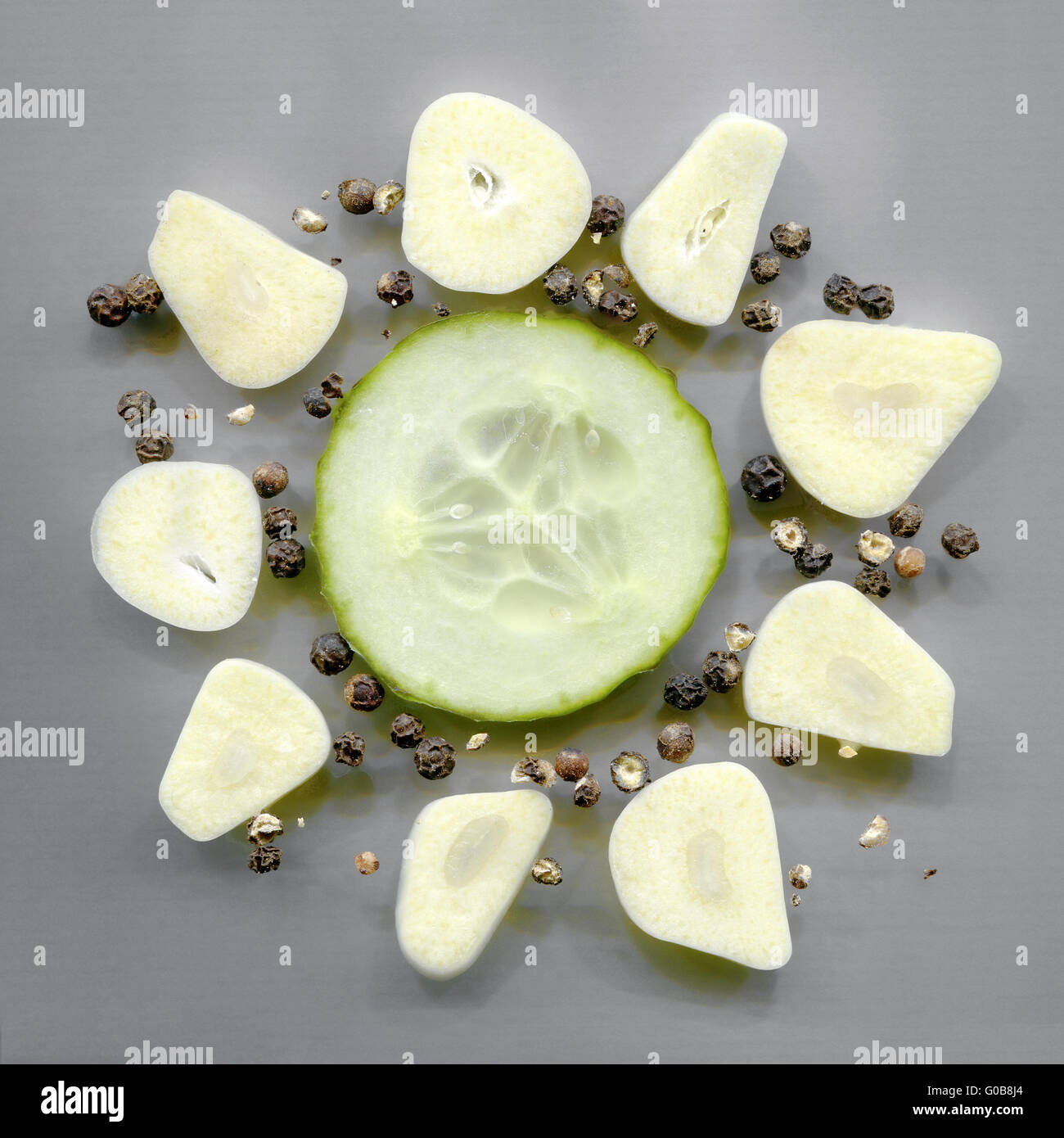 cucumber slice, garlic cloves and black peppercorn Stock Photo