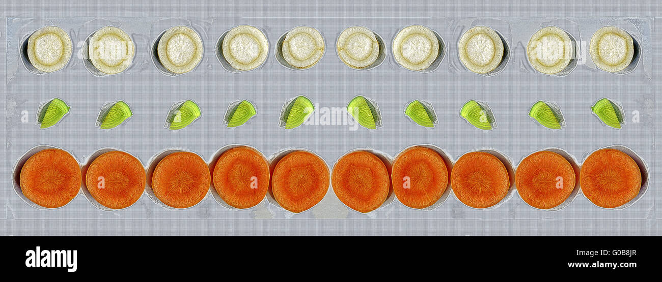 pattern - slices of carrots, leek and parsley root Stock Photo