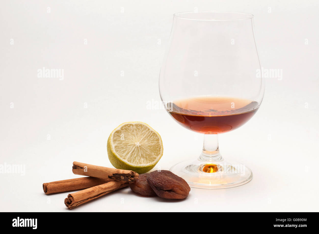spirit in a glass with spices and flavors, isolate Stock Photo