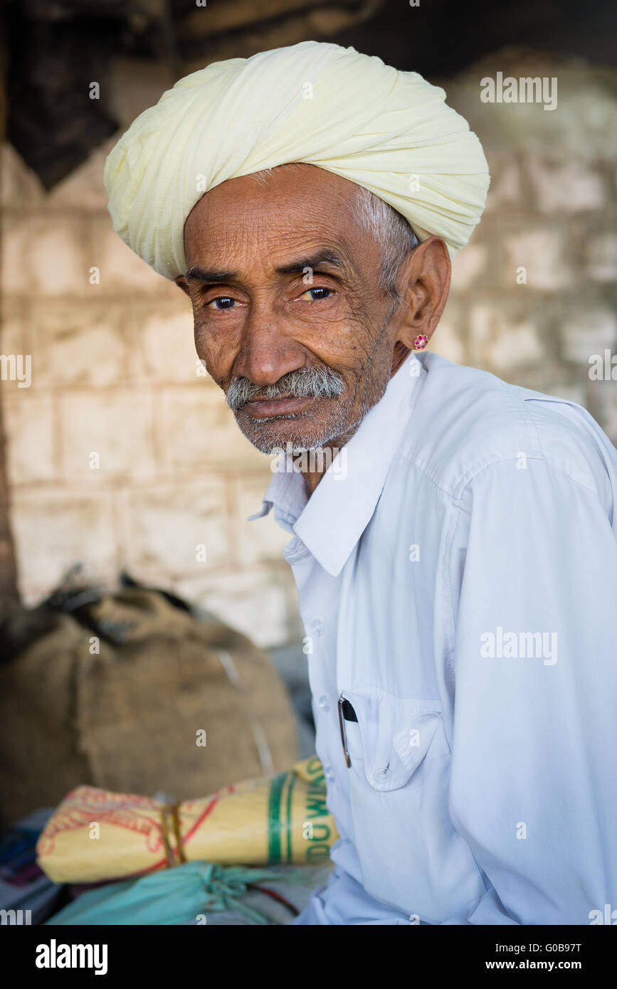 Portrait of man in turban in village in Rajasthan Stock Photo - Alamy