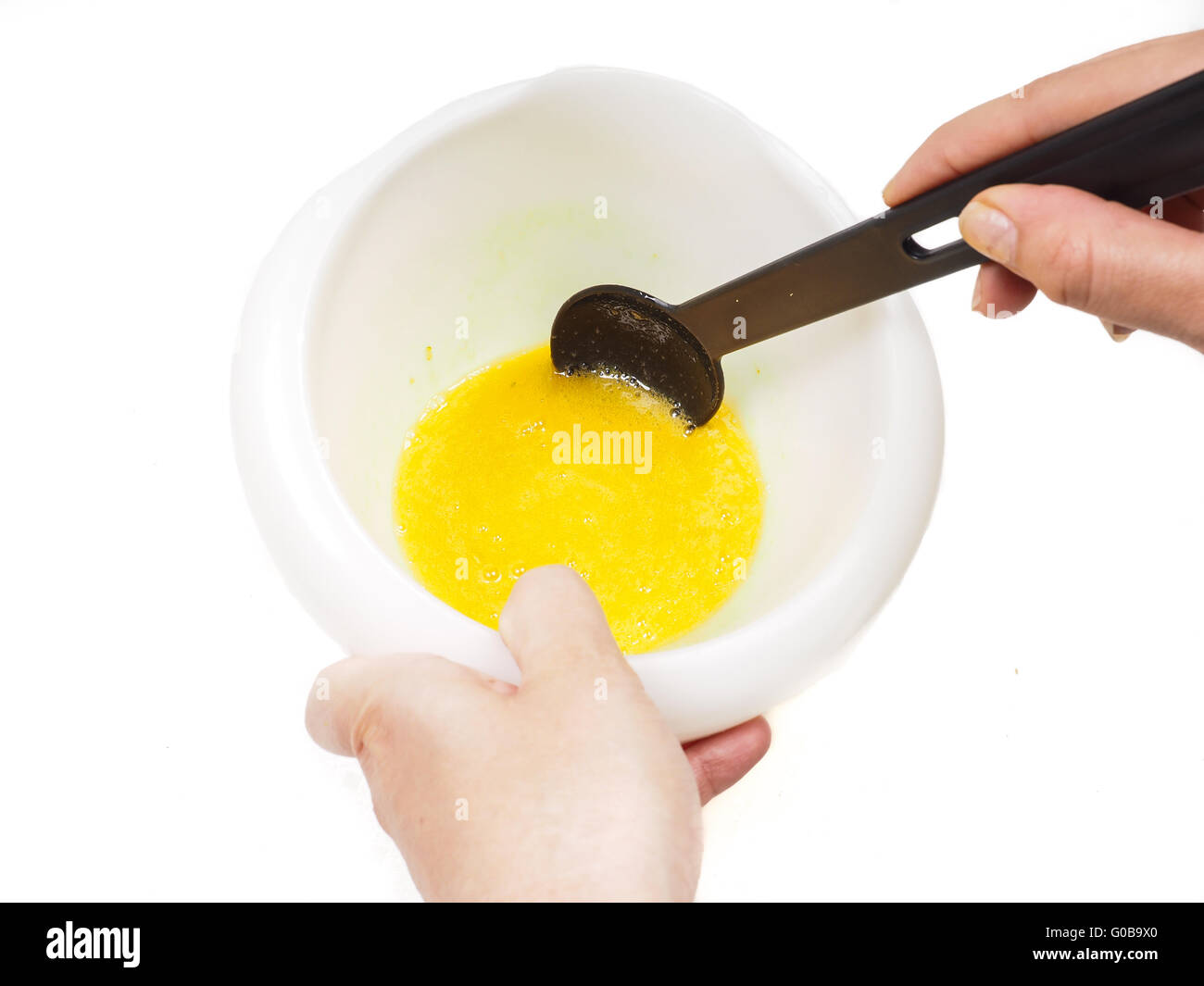 Egg yolk and melted butter Stock Photo Alamy