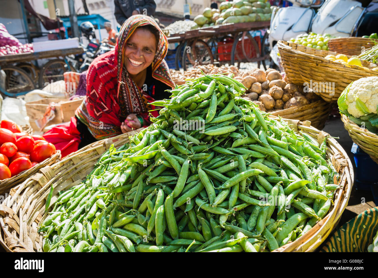 Rajasthani woman selling vegetables in Udaipur market Stock Photo Alamy