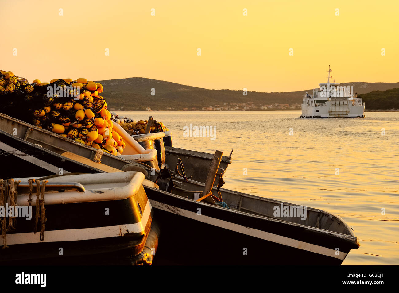 Fishing boats with fishing net in the harbor at su Stock Photo