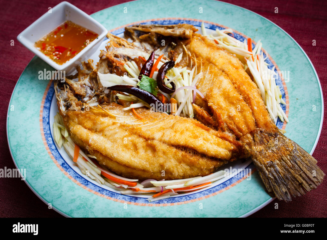 Deepfried snapper with spicy sauce, style thai food Stock Photo Alamy
