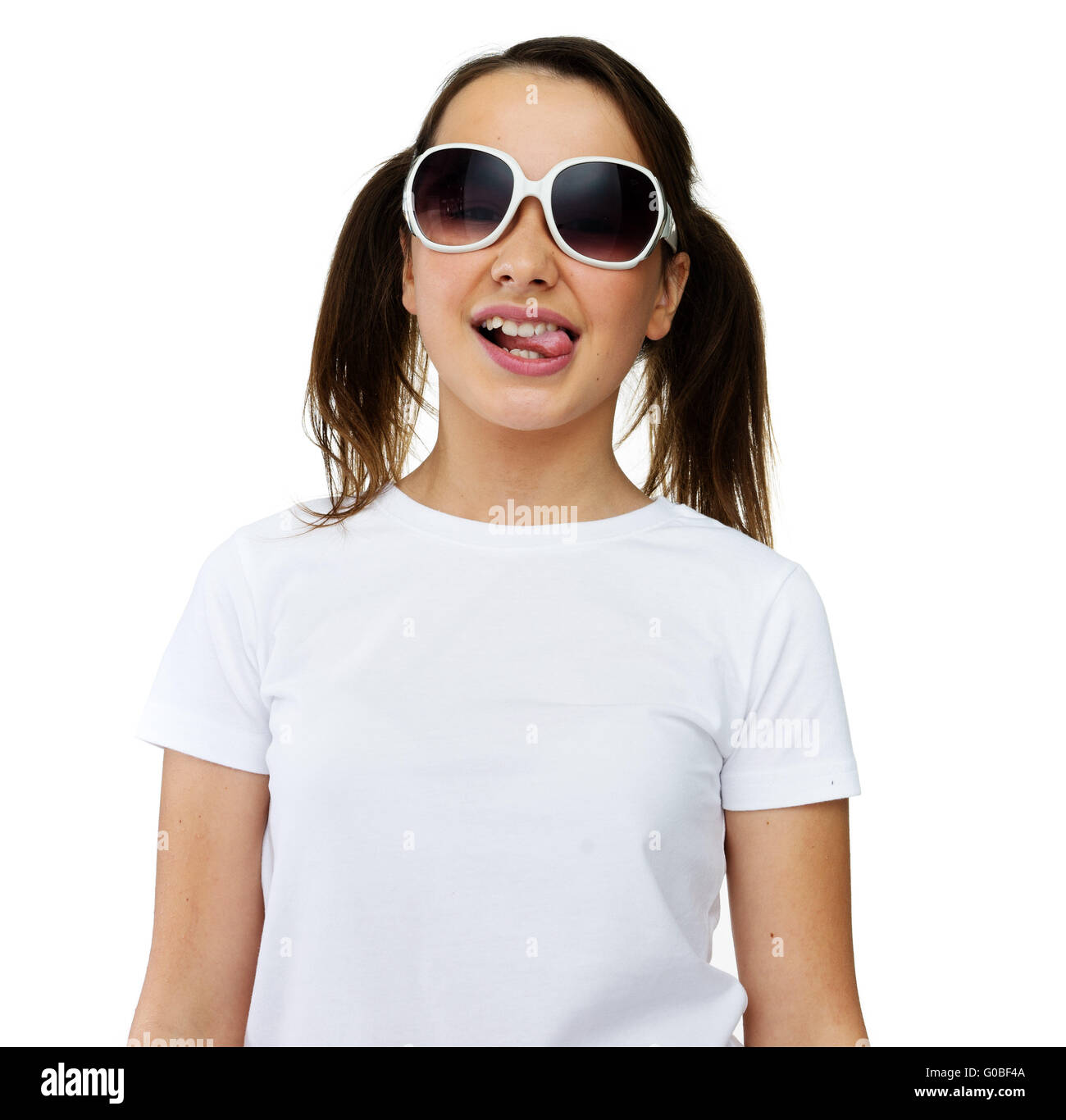 Smiling pretty young girl in trendy sunglasses Stock Photo