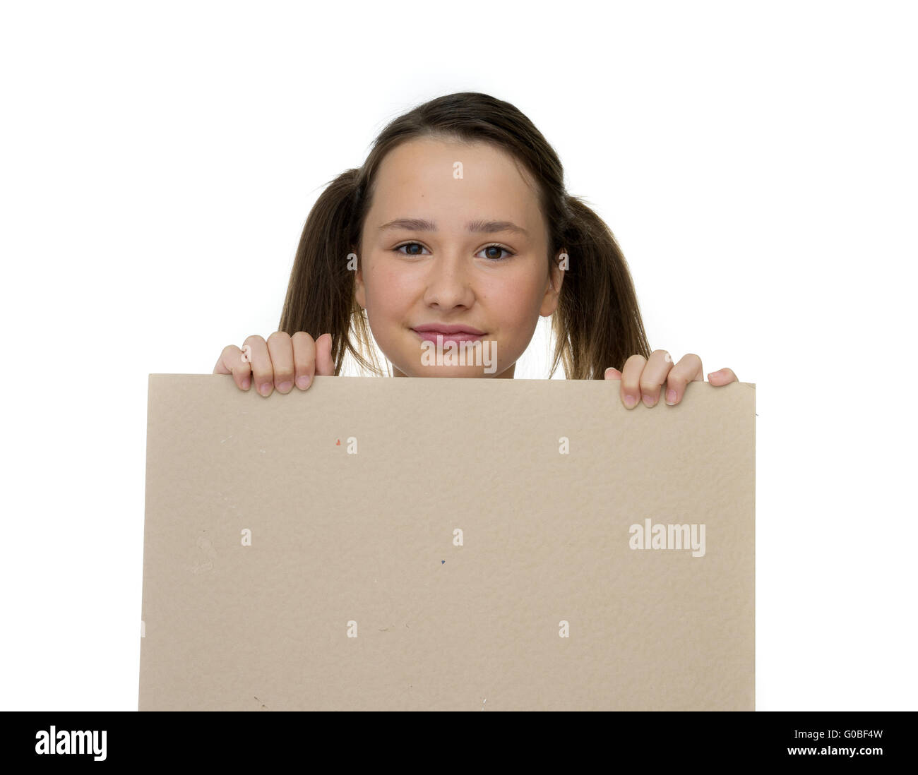 Trendy young girl holding to a blank card Stock Photo Alamy