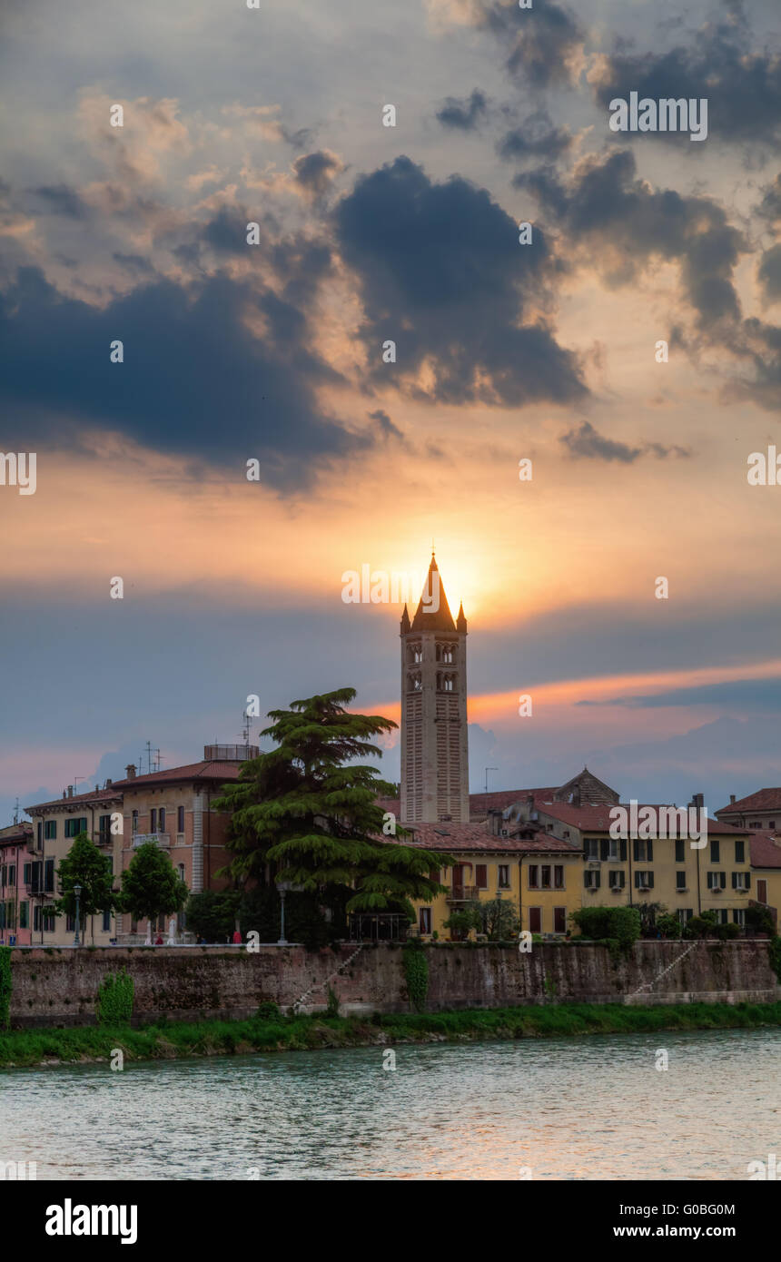 Verona at the Adige River at sunset Stock Photo - Alamy