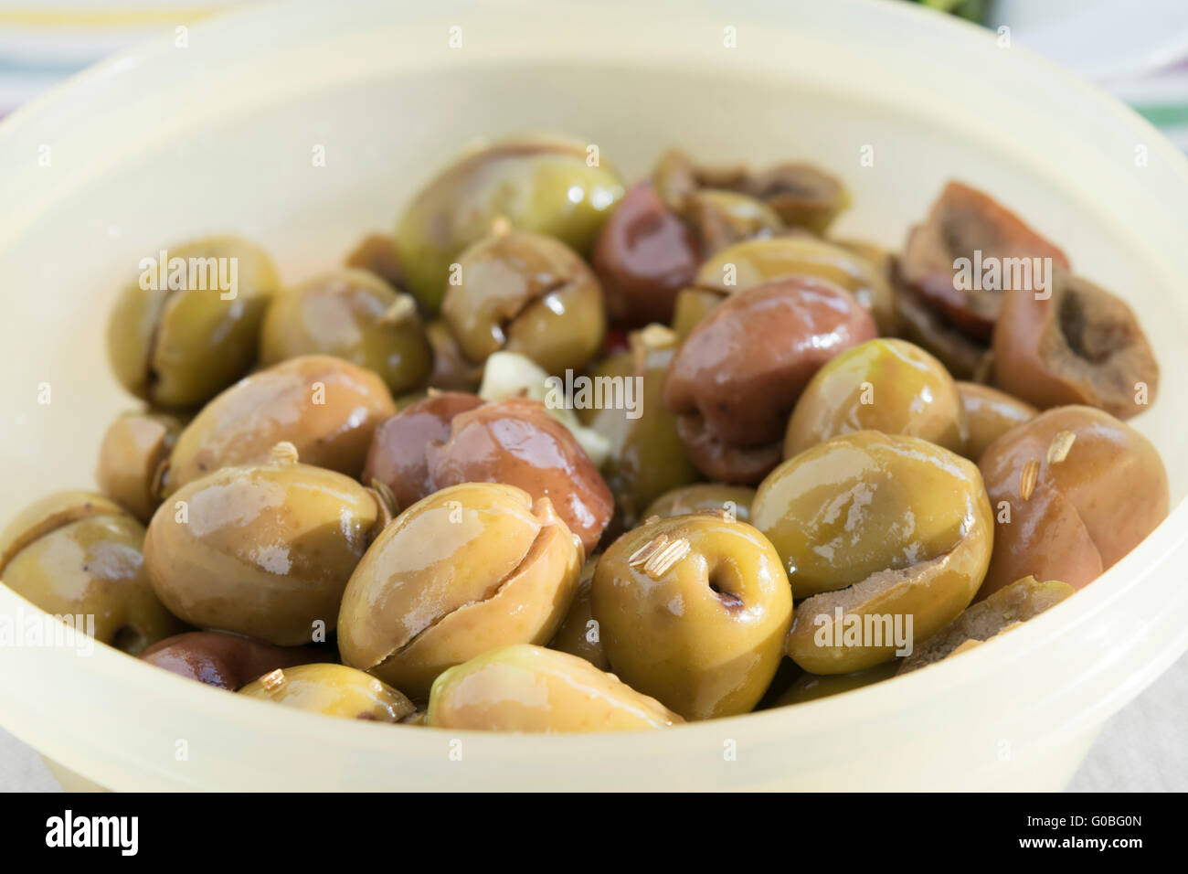 green olives called baresane seasoned with olive oil and fennel seeds Stock  Photo - Alamy