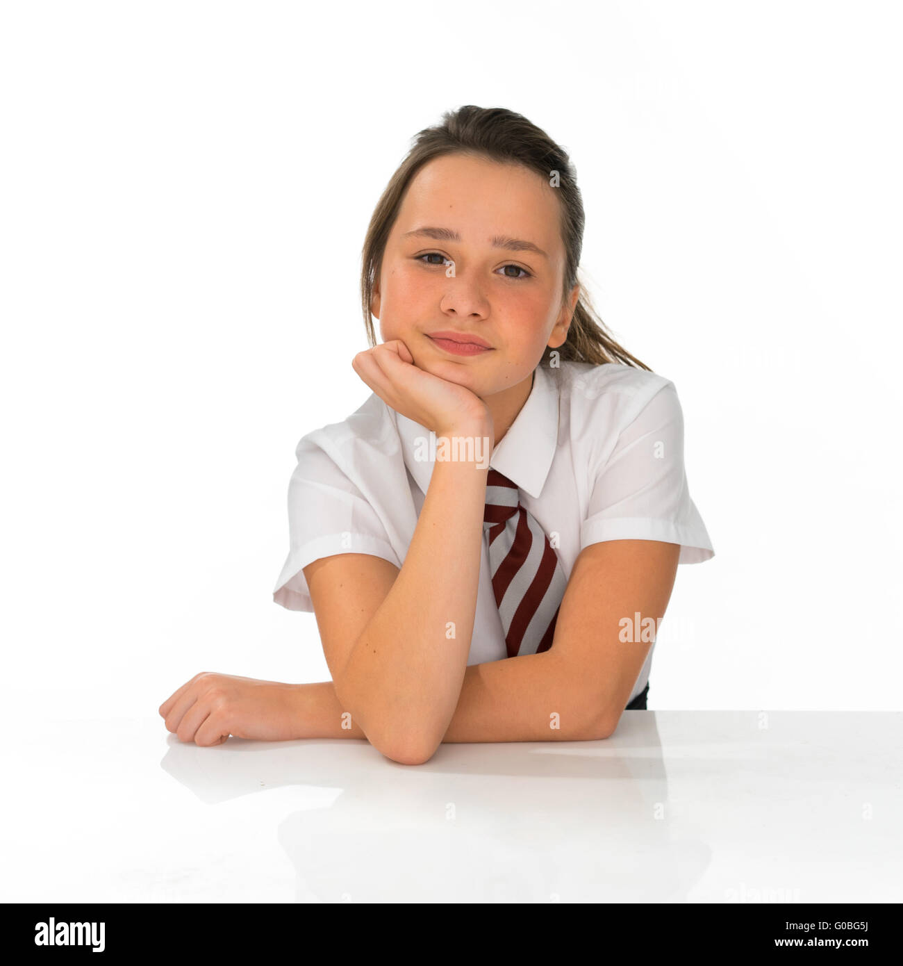 Bored young girl in school uniform Stock Photo