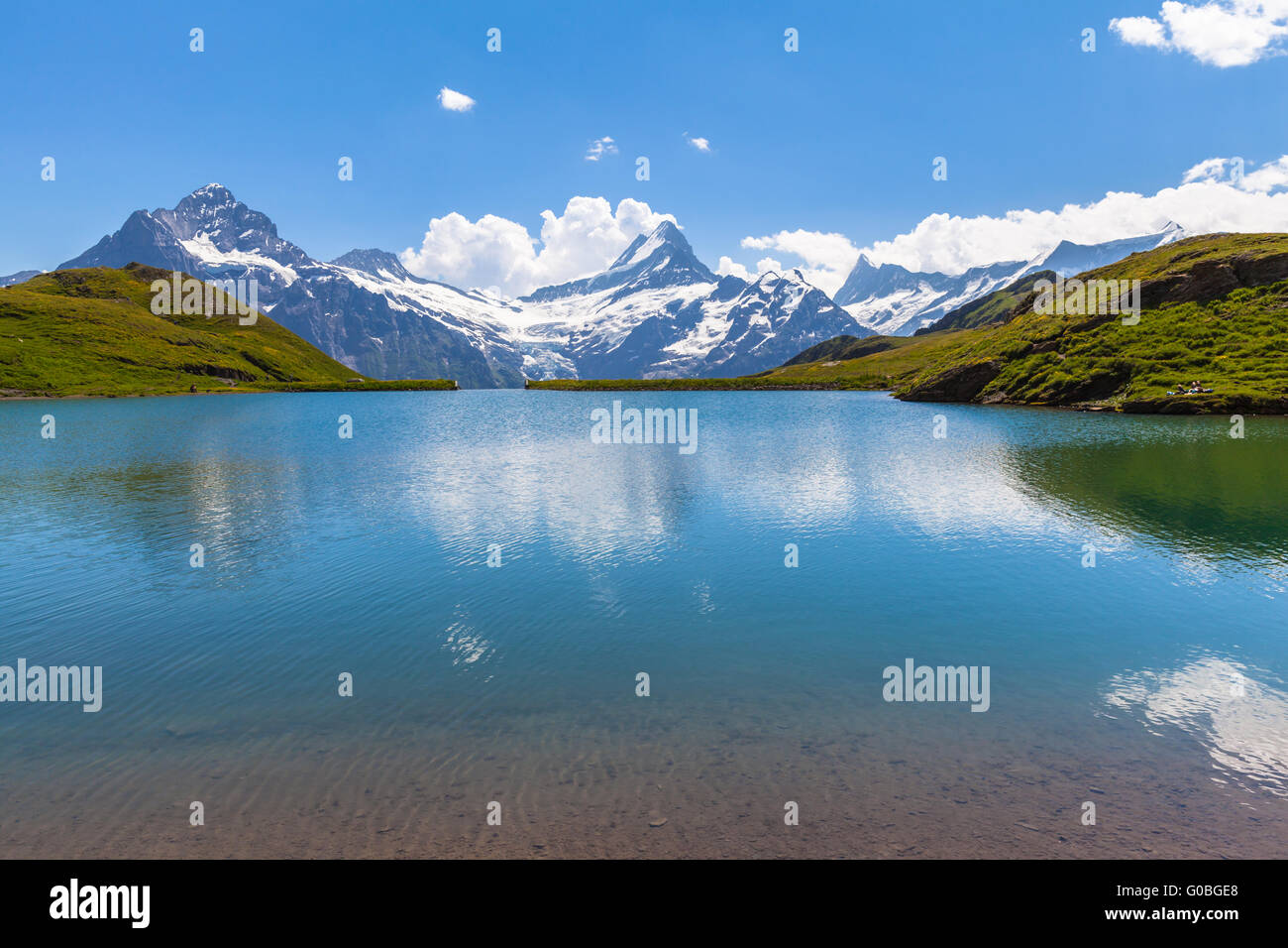 Stunning view of Bachalpsee and the snow coverd peaks with glacier of swiss alps, on Bernese Oberland, Switzerland. Stock Photo