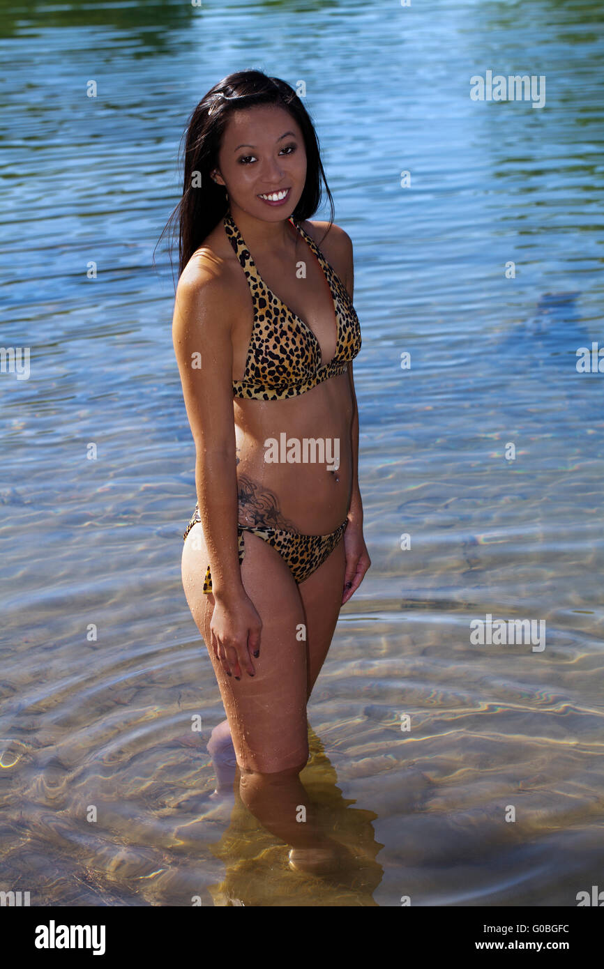 Young Skinny Asian American Woman Standing River Stock Photo - Alamy