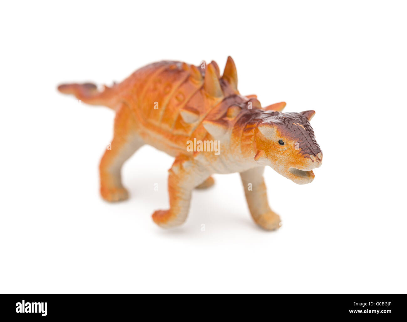 orange Pinacosaurus toy on a white background Stock Photo - Alamy