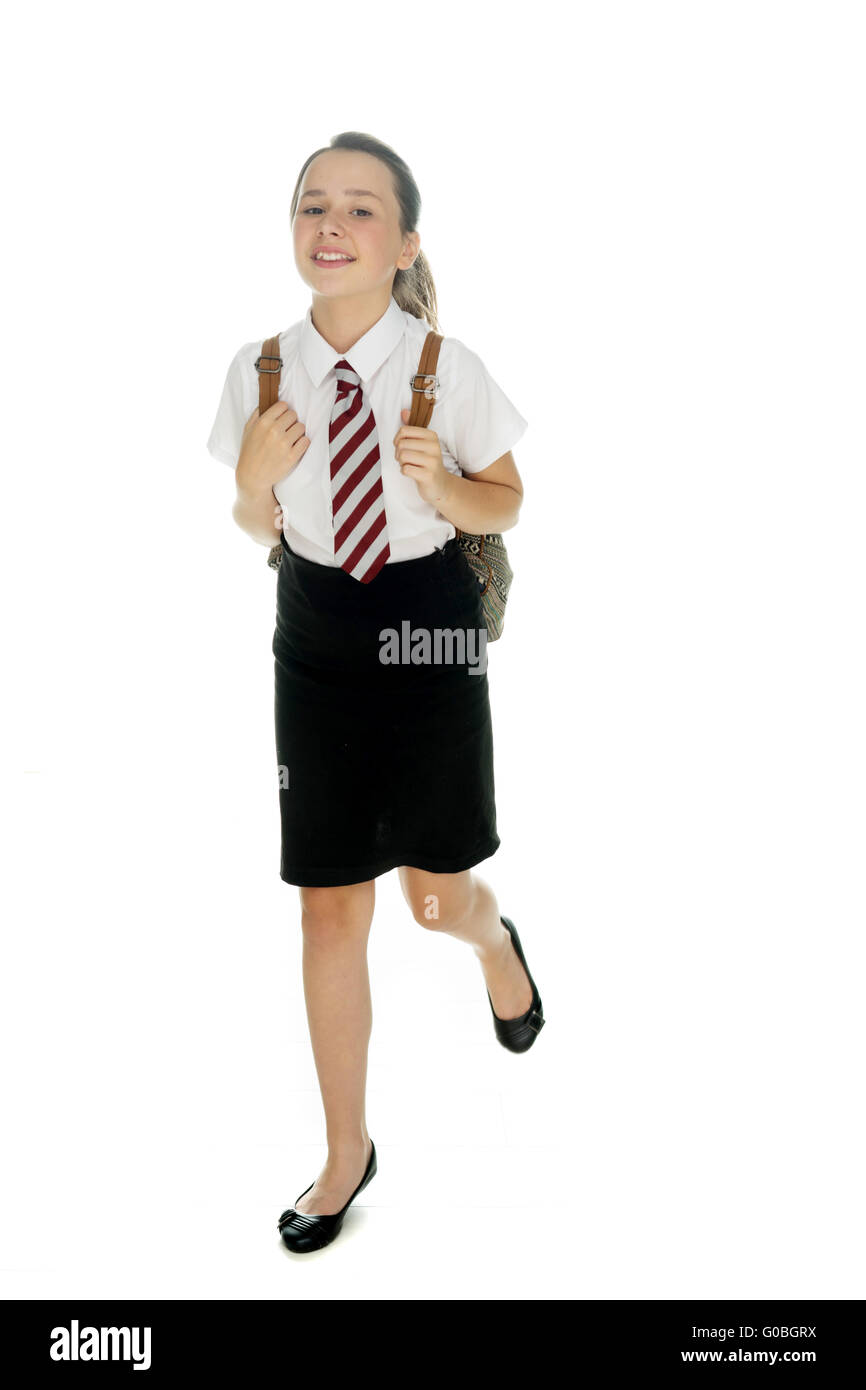 Happy attractive young girl in school uniform Stock Photo