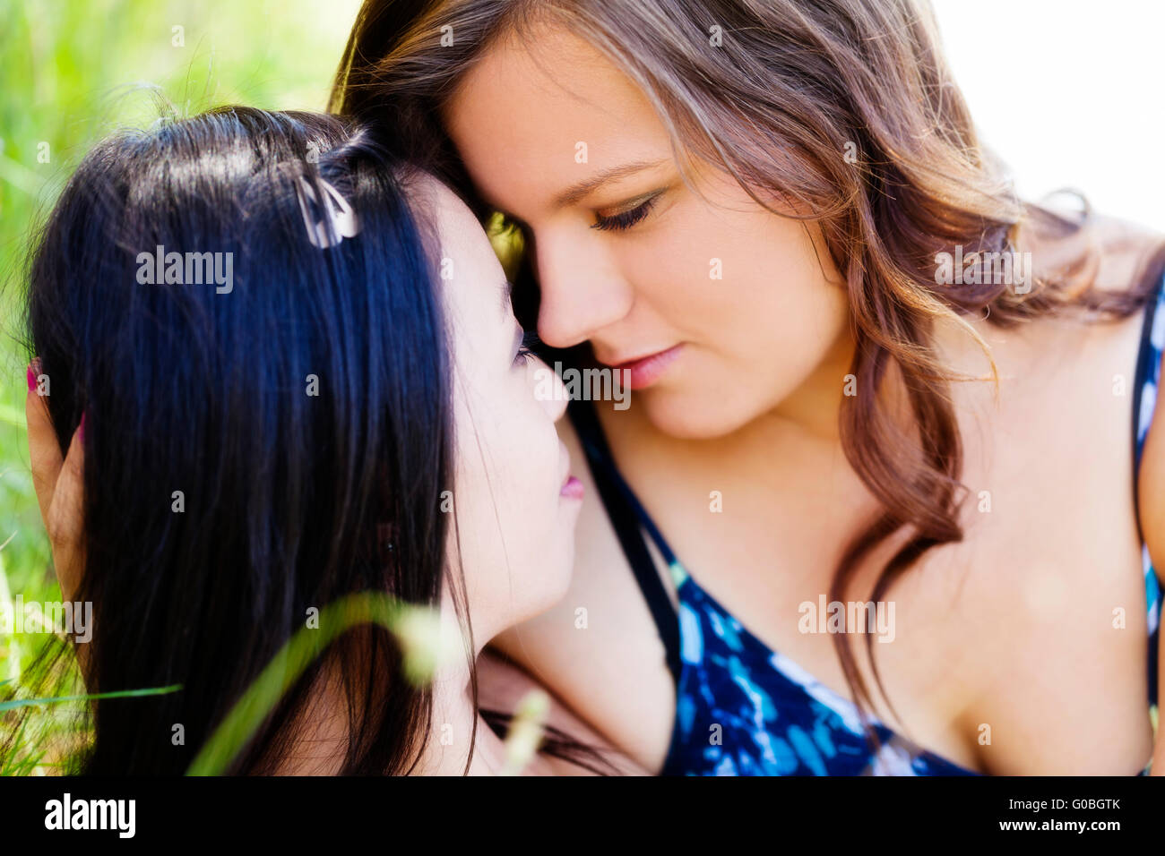 Two pretty asian women one hi-res stock photography and images - Alamy