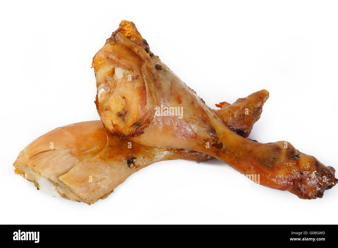 Baked chicken drumstick on white background Stock Photo