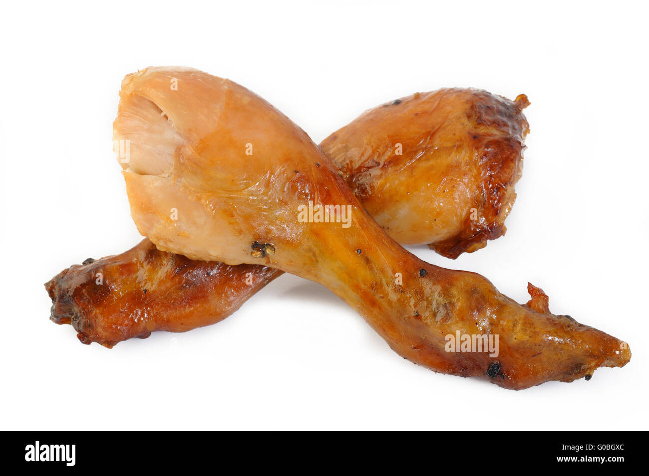 Baked chicken drumstick on white background Stock Photo