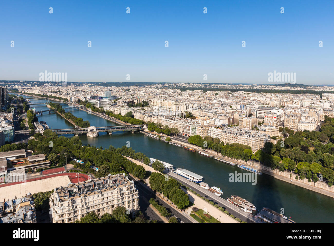 Cityscape of Paris with aerial view from Eiffel tower - the Seine river and residential buildings in morning sunshine Stock Photo