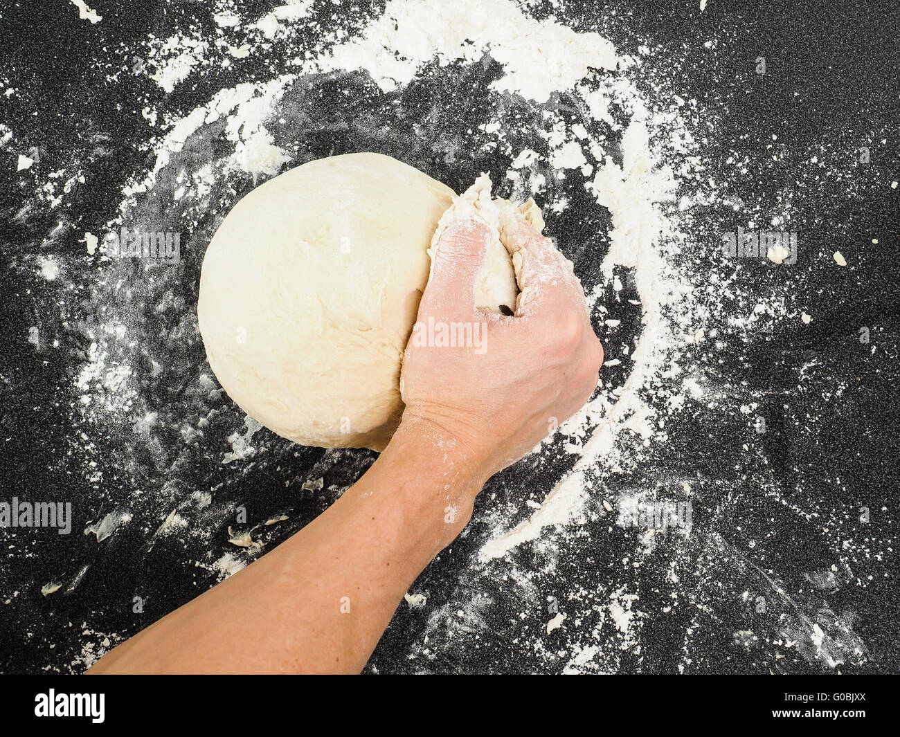 Picture of Hands kneading dough Stock Photo - Alamy