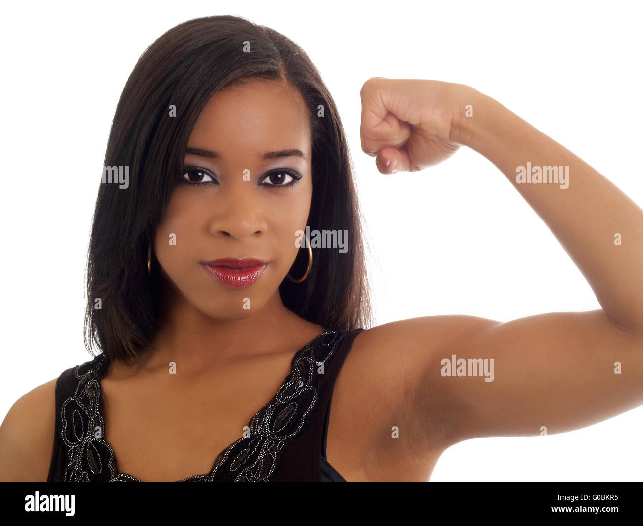 Portrait of Black woman showing strong left arm Stock Photo Alamy