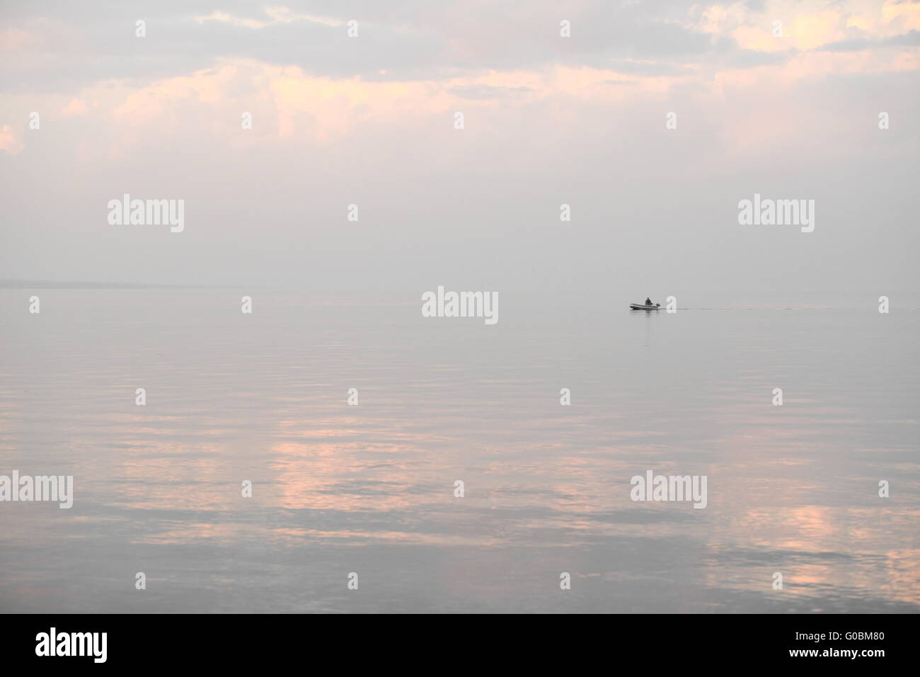 silhouette of a fishing boat Stock Photo - Alamy