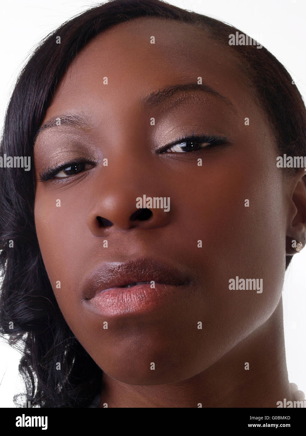 Pretty young Black woman in closeup portrait Stock Photo - Alamy