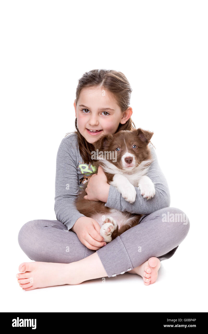 little girl with a border collie Stock Photo