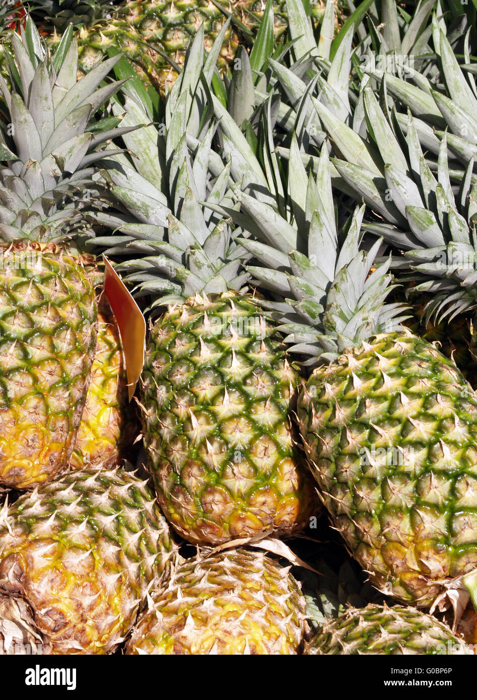 Pineapples for sale hires stock photography and images Alamy