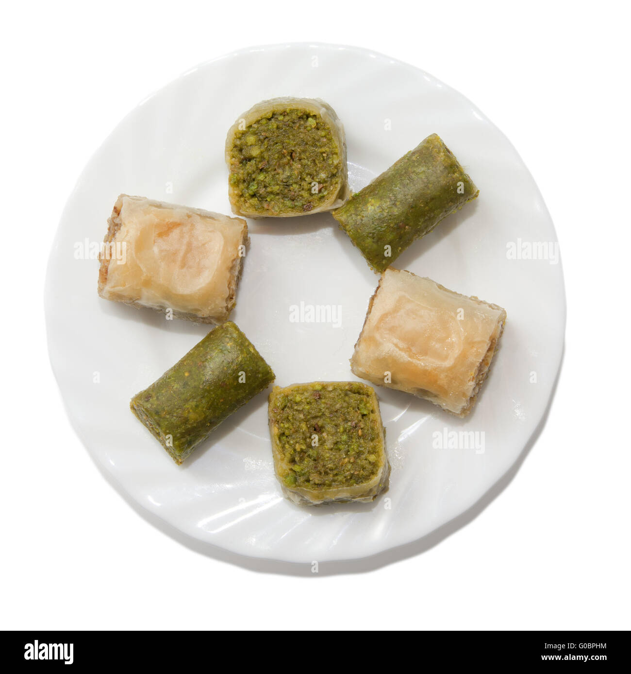 Plate with turkish baklava isolated over white background Stock Photo