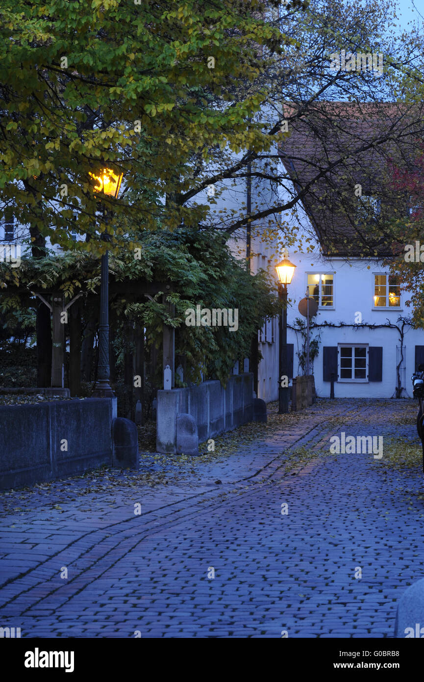 small street in german city Augsburg at night Stock Photo
