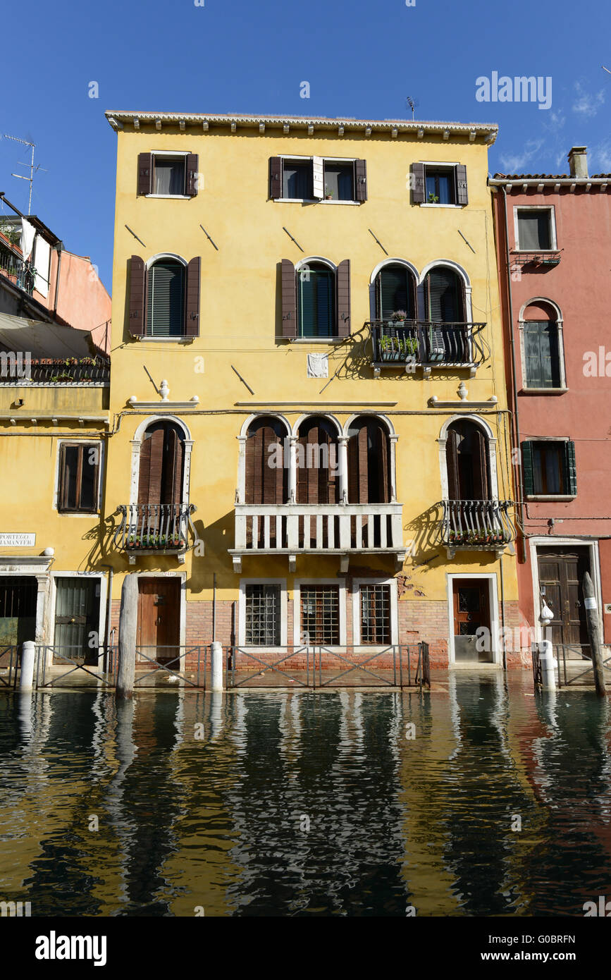 Yellow Home along the Grand Canal in Venice Italy Stock Photo - Alamy
