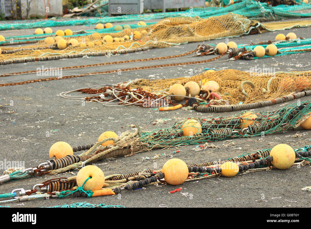 Fishing nets spread on the ground Stock Photo - Alamy