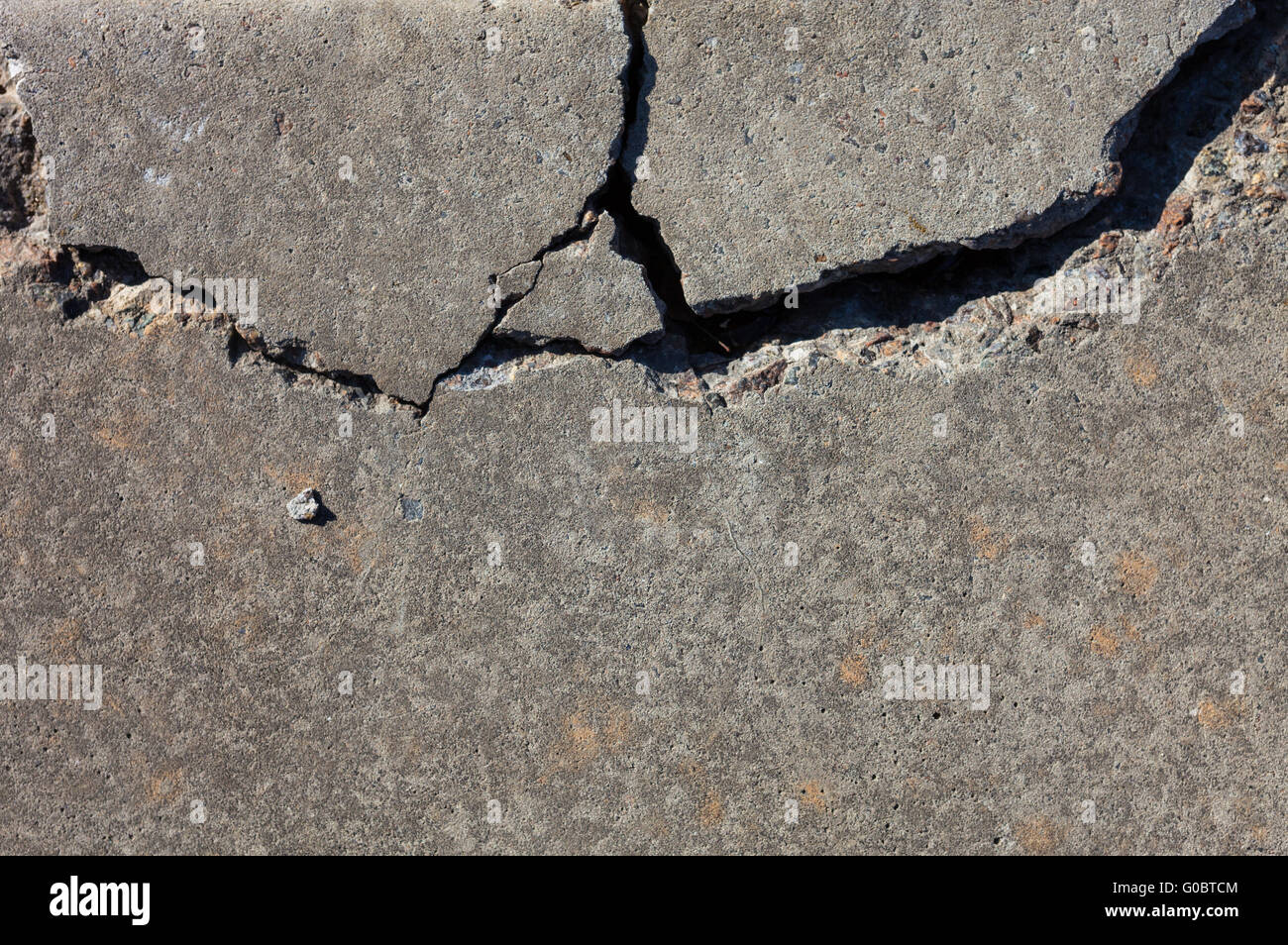 Cracked concrete surface Stock Photo