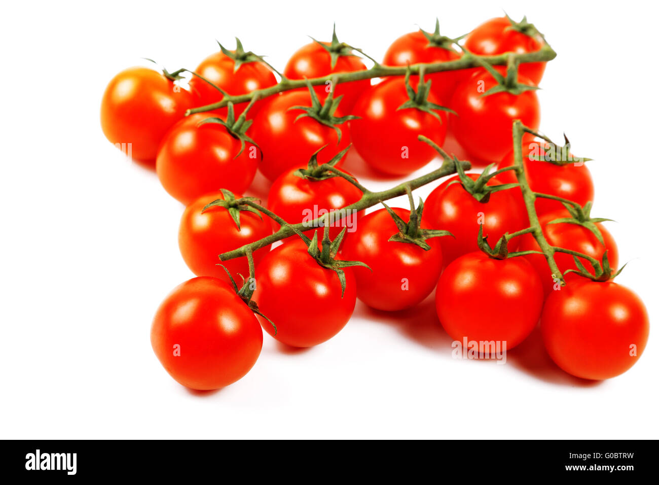bunnch of cherry tomatoes isolated on a white background Stock Photo ...