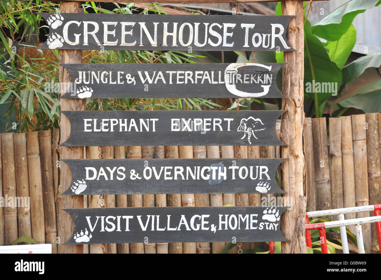 'Green House Tour' sign, Senmonorom, Mondulkiri Province, Cambodia. credit: Kraig Lieb Stock Photo
