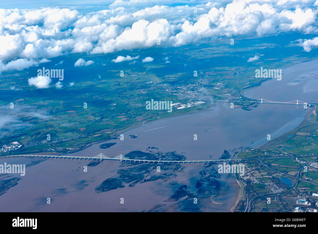 Aerial view River Severn Estuary with old and new Severn road bridges, between England and Wales Stock Photo