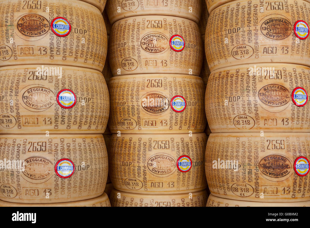 Wheels of Parmesan - famous italian hard cheese. Stock Photo