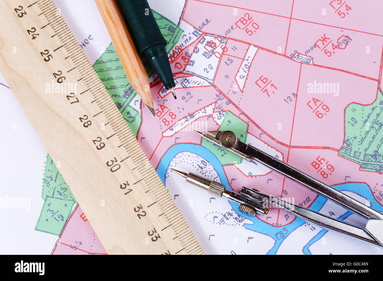 Topographic map of district with measuring instrument Stock Photo Alamy