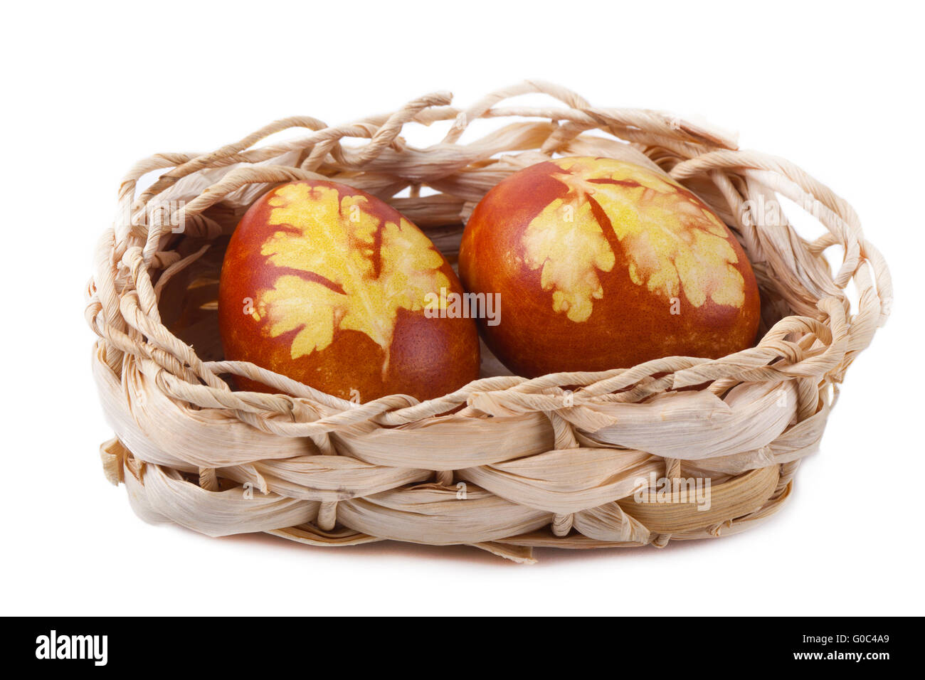 Easter eggs and basket isolated Stock Photo