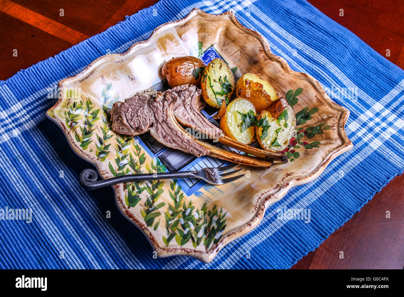 Lamb chops with potatoes Stock Photo - Alamy