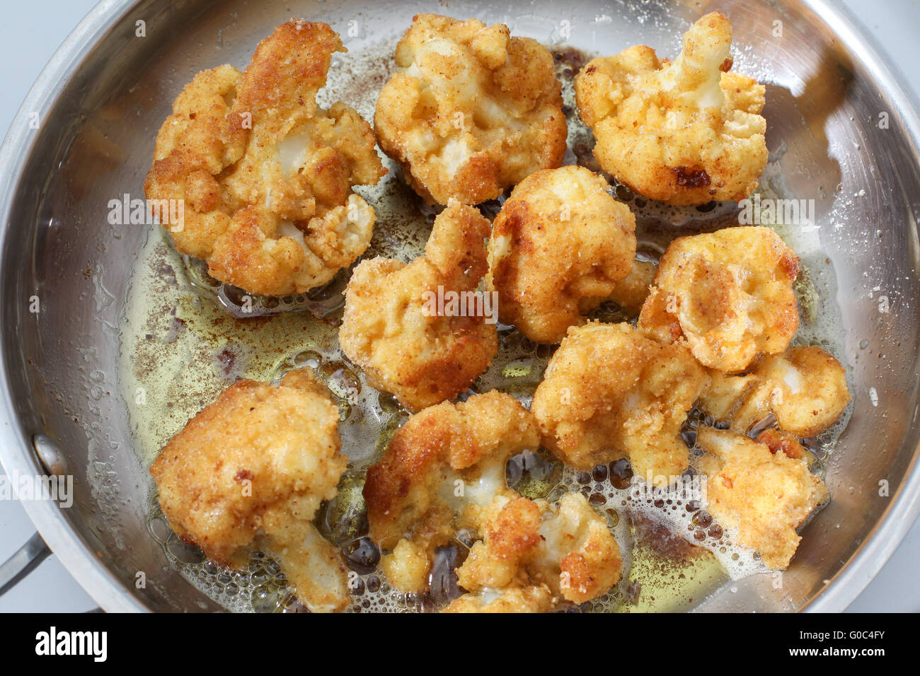 Cauliflower inside fry pan Stock Photo Alamy