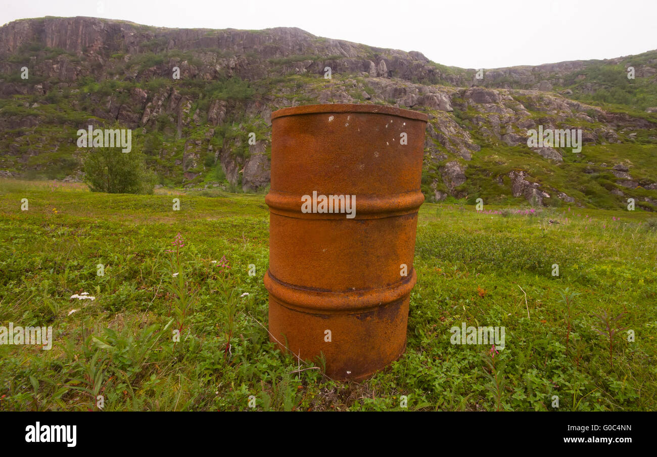 empty barrels in the Arctic environmental pollution Stock Photo