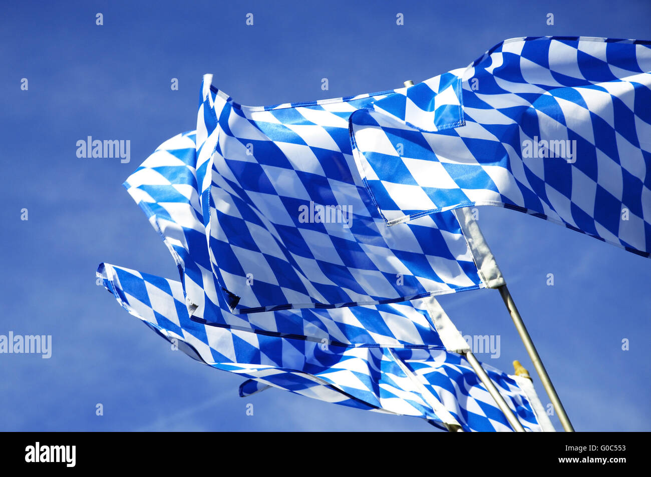 Bavarian Flags waving over Oktoberfest Stock Photo