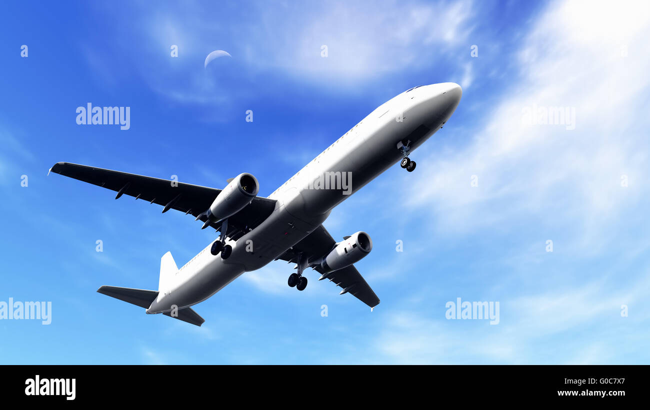 Airplane in the blue sky Stock Photo - Alamy