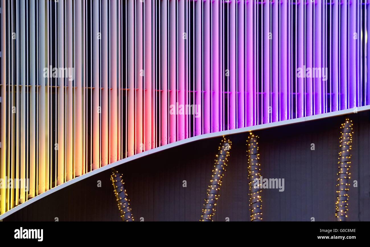 modern building illuminated with rainbow colors Stock Photo