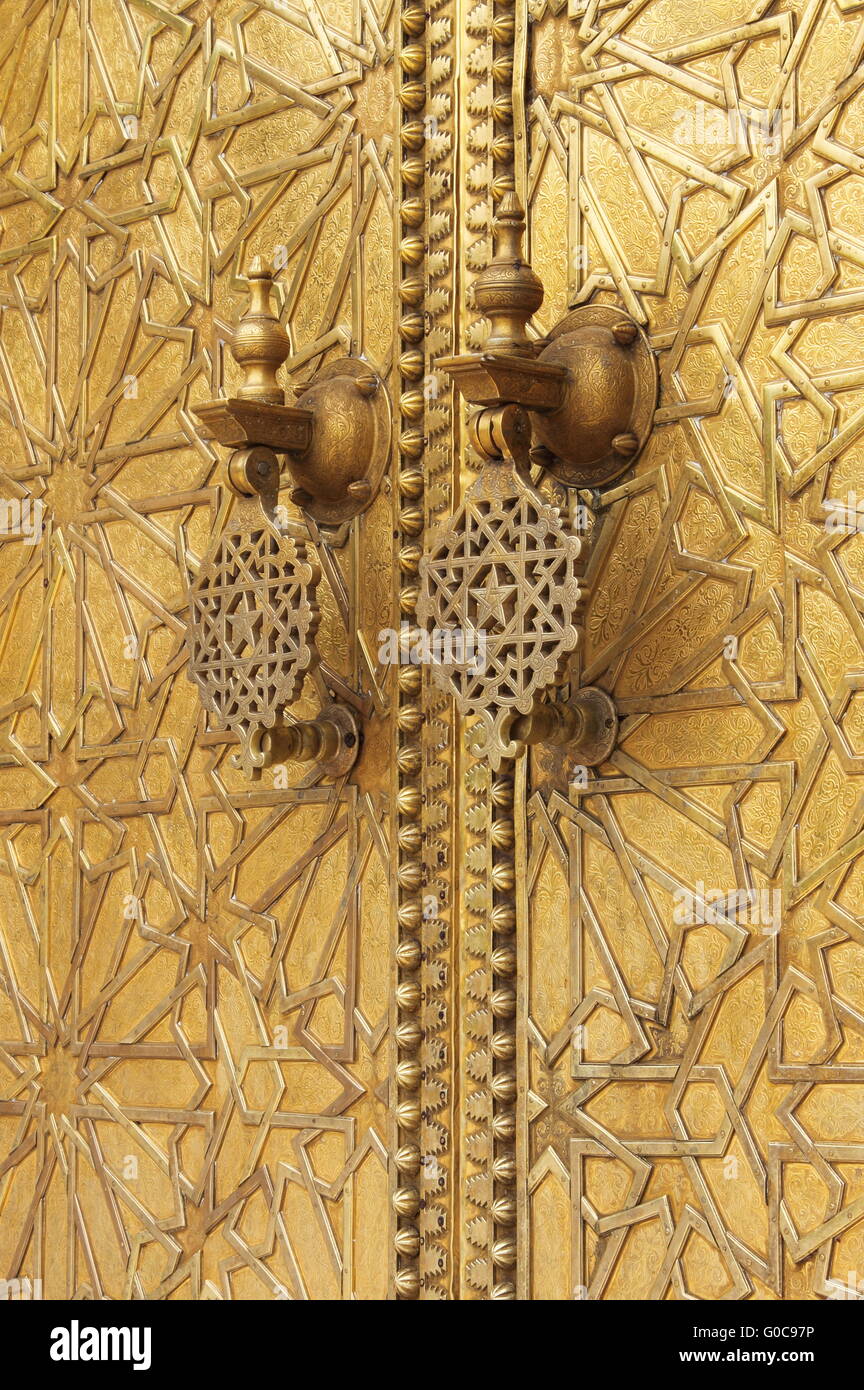 The golden door knockers of the Royal Palace in Fes Stock Photo